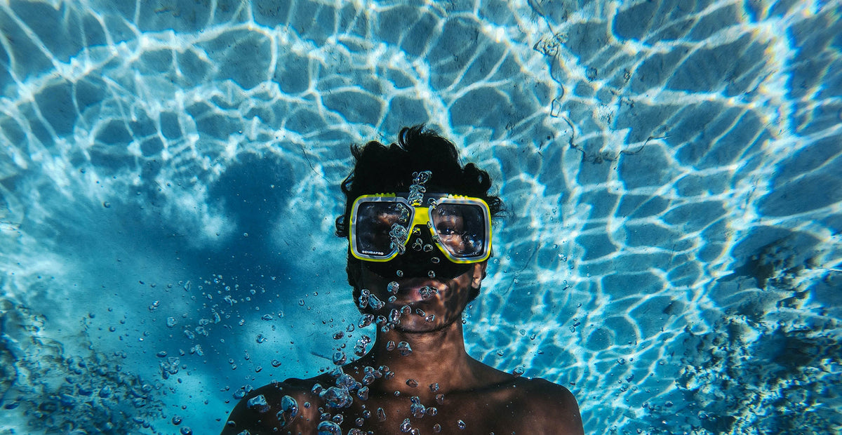 Kid taking selfie under water